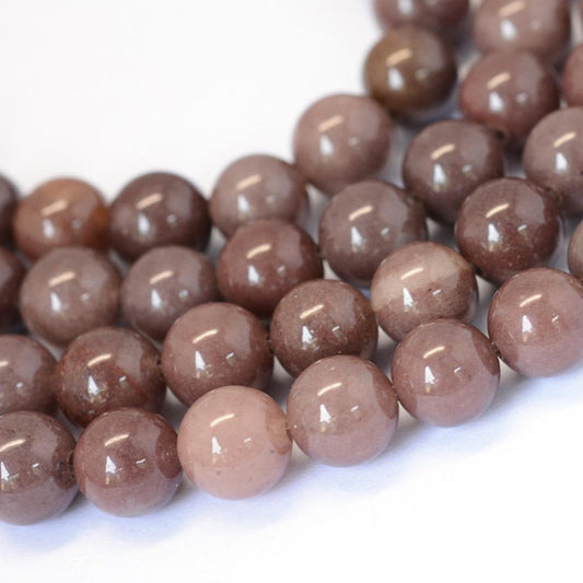 Aventurine purple (brun). 6 mm. Hel streng.