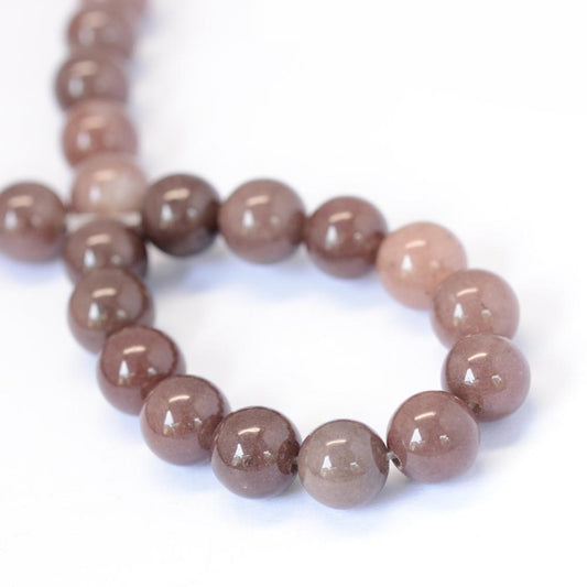 Aventurine purple (brun). 6 mm. Hel streng.