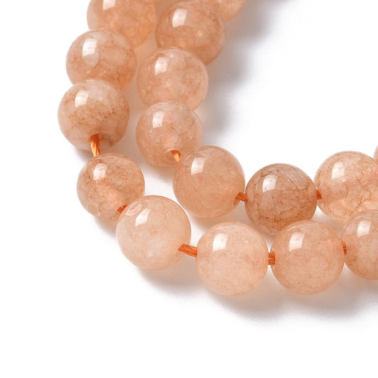Jade sunstone-look. 6 mm. Hel streng.