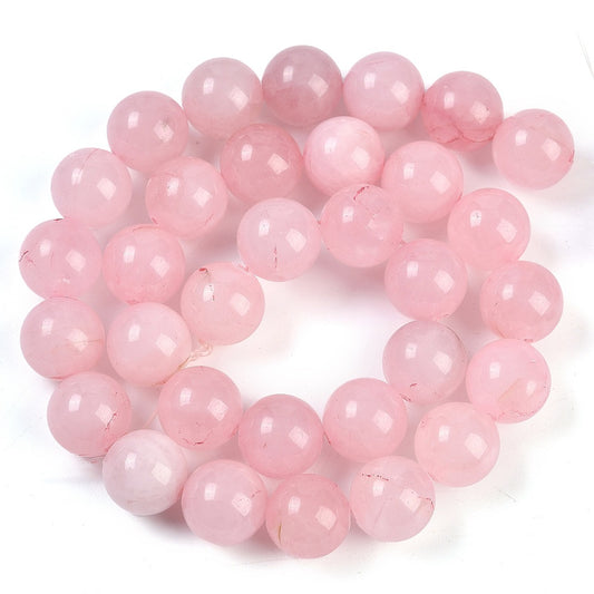 Rosa quartz. 12 mm. Hel streng.