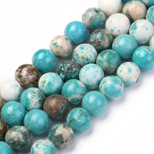 Howlite naturel 6mm. Hel streng på ca. 38 cm.