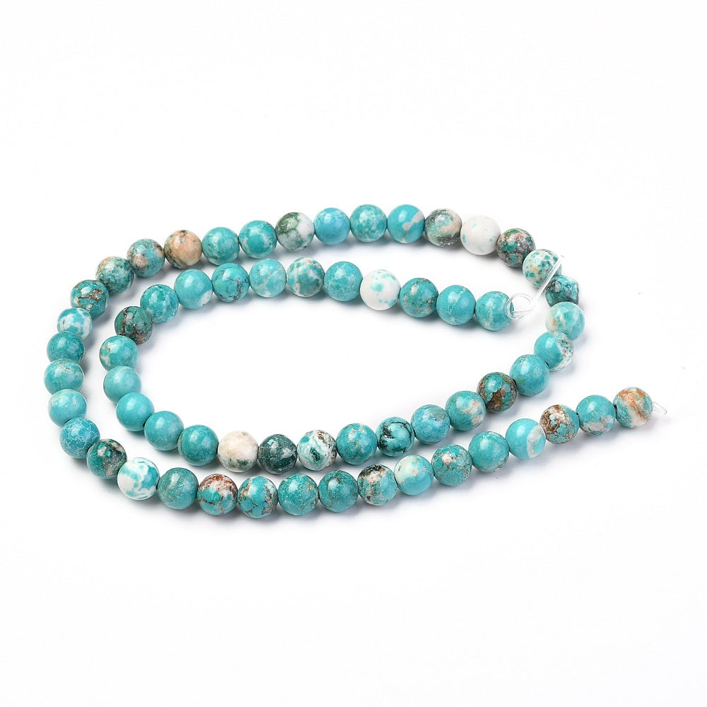 Howlite naturel 6mm. Hel streng på ca. 38 cm.