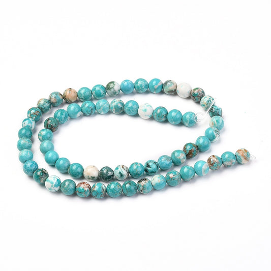 Howlite naturel 6mm. Hel streng på ca. 38 cm.