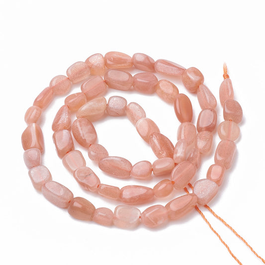 Sunstone nuggets ca. 8x6 mm. Hel streng.
