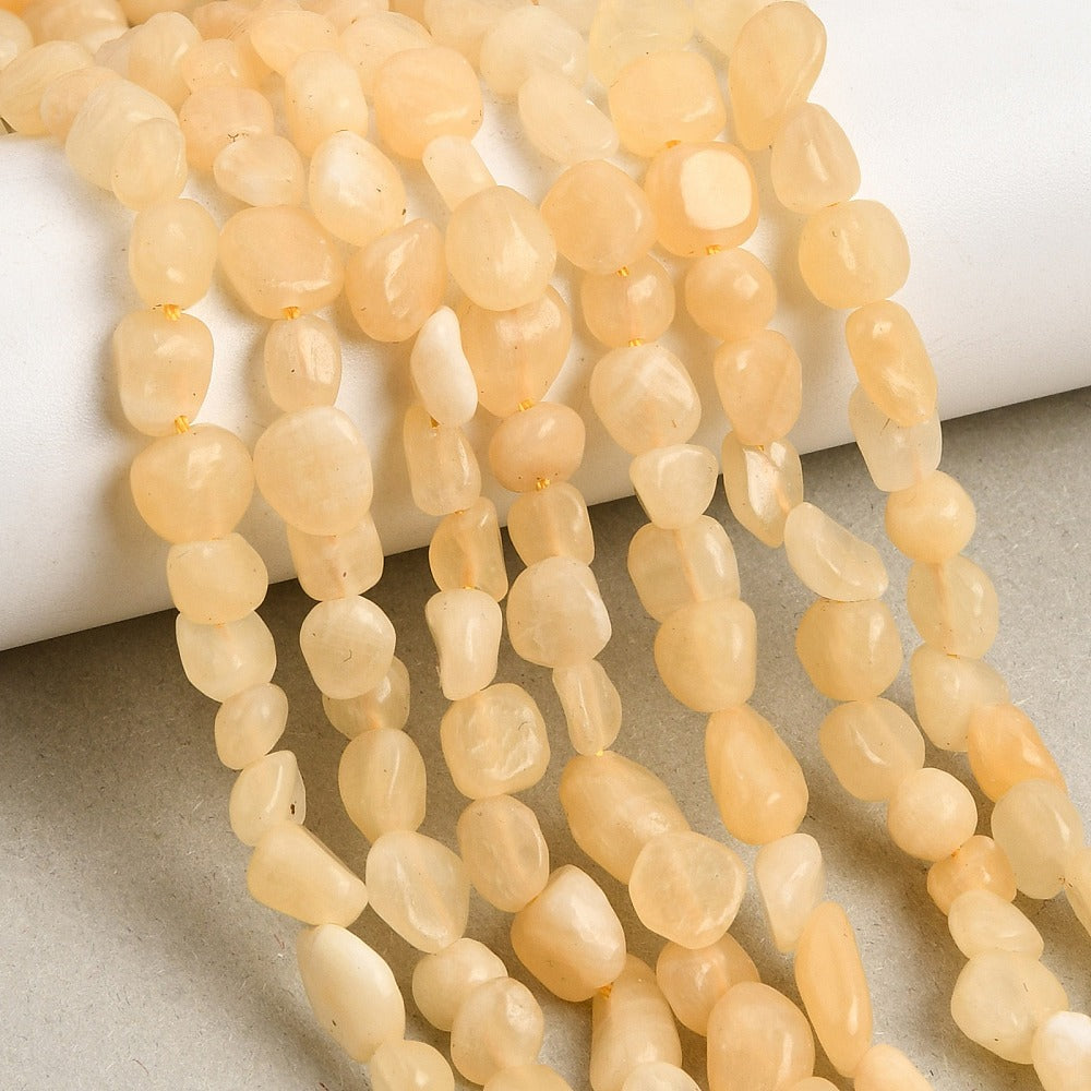 Topas jade nuggets. Gule 7-10mm. Hel streng.