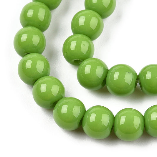 Runde glasperler 6 mm. Lys oliven jade look. Hel streng.