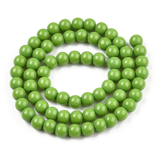 Runde glasperler 6 mm. Lys oliven jade look. Hel streng.