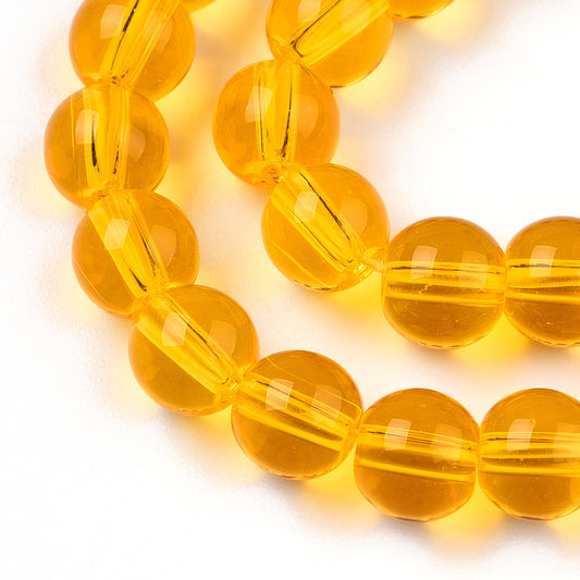 Runde glasperler, klare solgule, 6 mm. Hel streng.