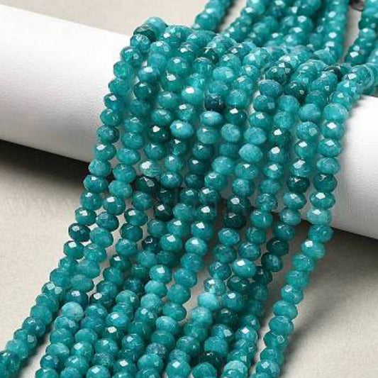 Jadefacetter rondeller. Cyan 4x3 mm. Hel streng.