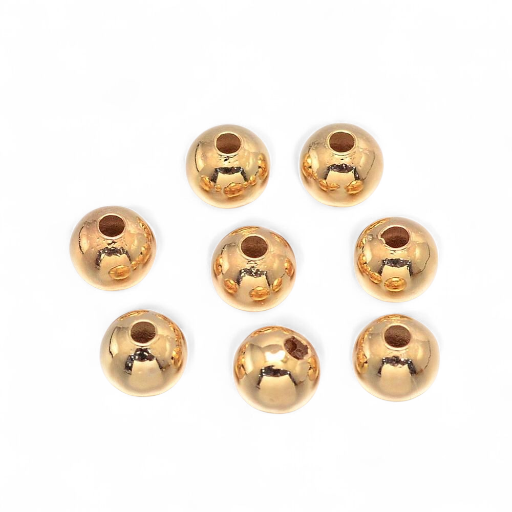Mellemperler kugler 4 mm. 18k guld. ca. 30 stk.