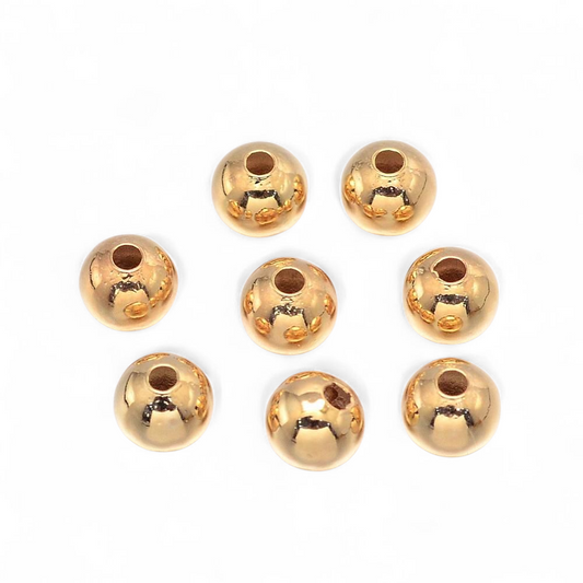 Mellemperler kugler 4 mm. 18k guld.  ca. 50 stk.