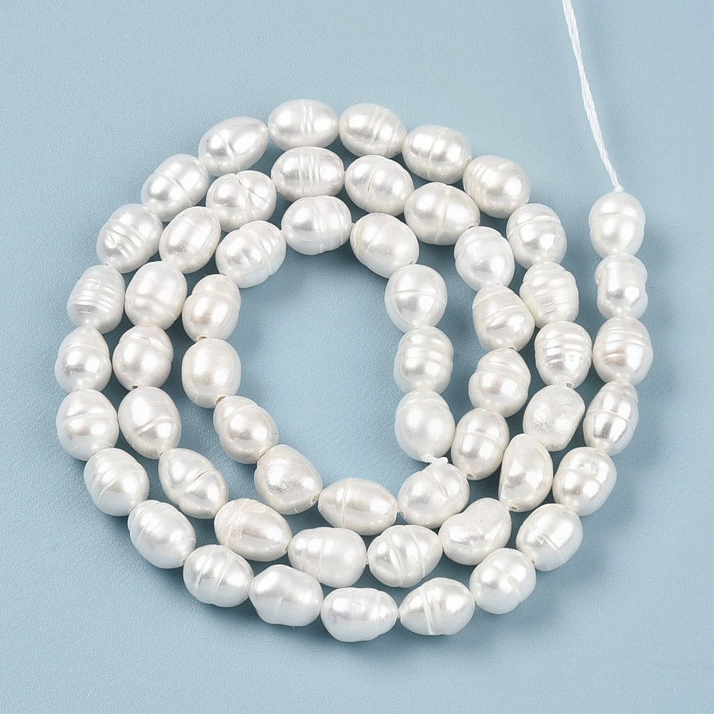 Ferskvandsperler hel streng rice. ca. 5x6,5 mm.