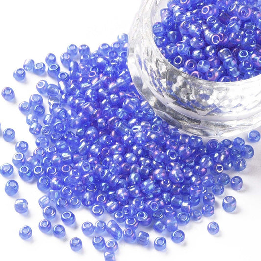 Seed beads blå transparent. Ca. 3 mm.