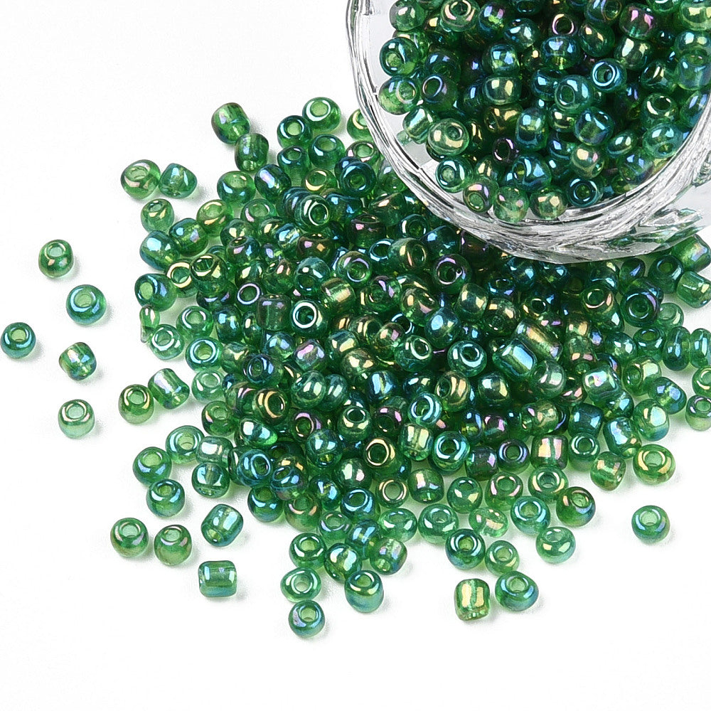 Seed beads grøn transparent. Ca. 3 mm.