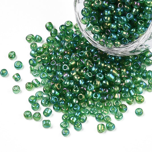 Seed beads grøn transparent. Ca. 3 mm.