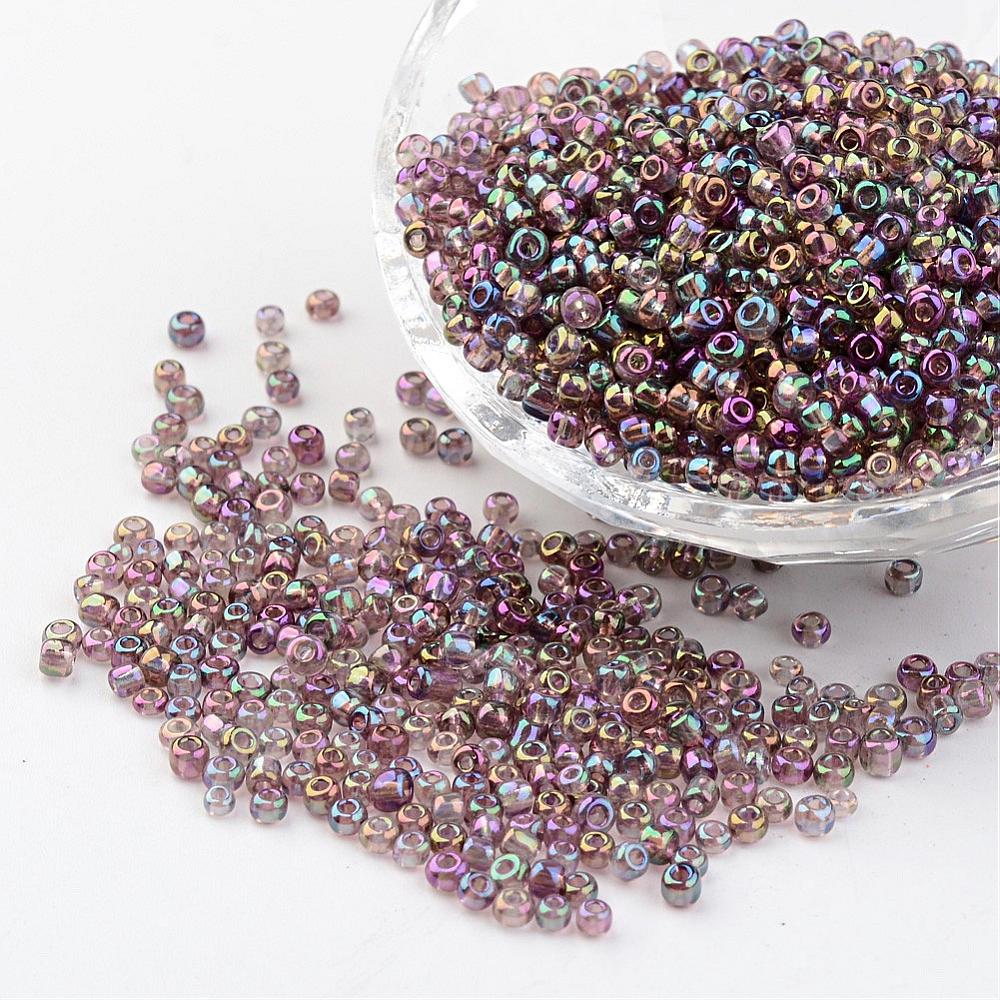 Seed beads rosebrown transparent. Ca. 3 mm.