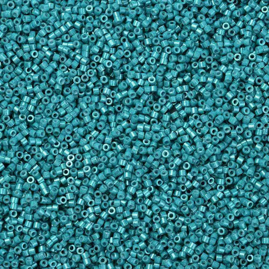 Cylinder delica style 2x1 mm. Mørk cyan