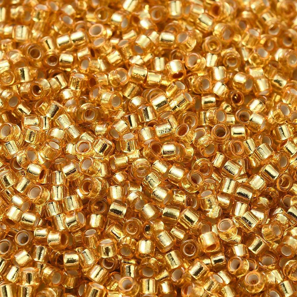 Cylinder delica style 2x1 mm. Guldfarvet