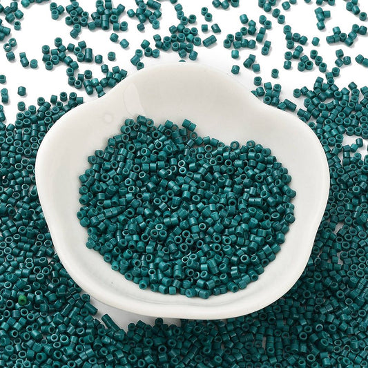 Cylinderperler delica style 2x1,5mm. 10g. Tealgrøn.