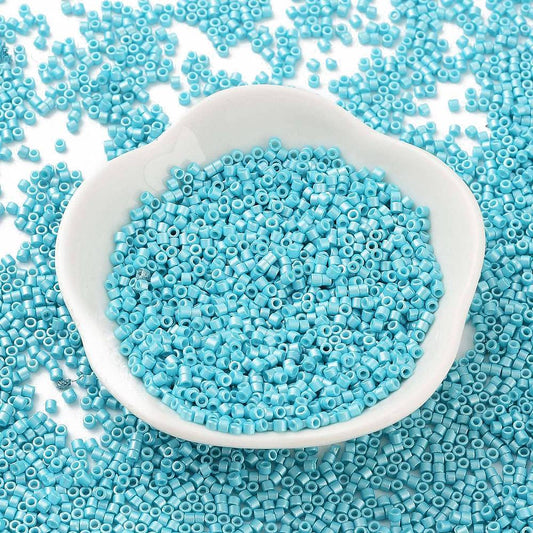 Cylinderperler delica style 2x1,5mm. 10g. Mørk turkis